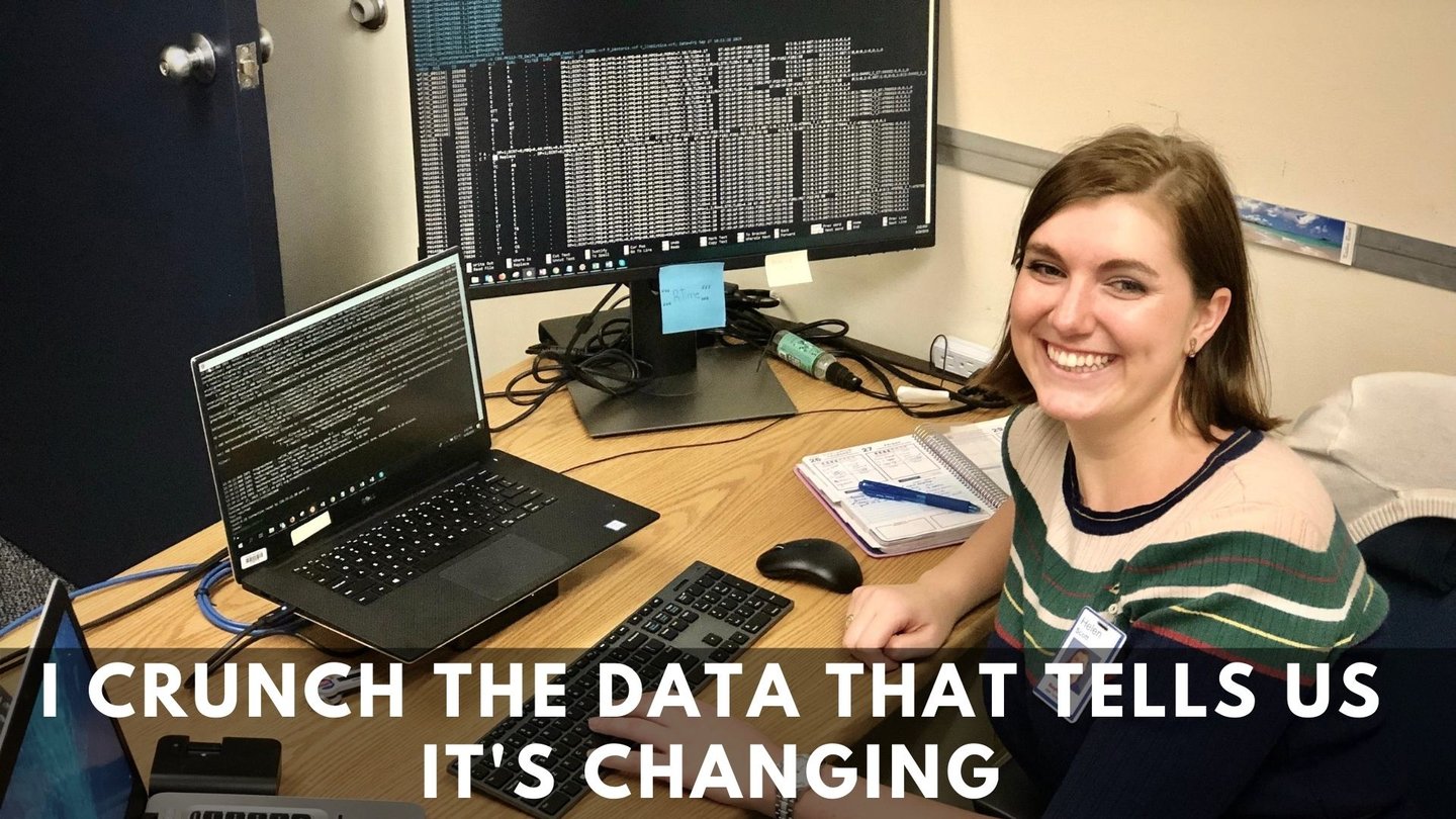 Photo of Helen coding at her desk