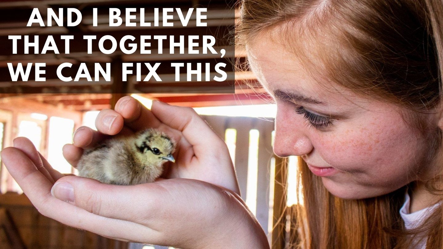 Photo of Helen and a baby chick